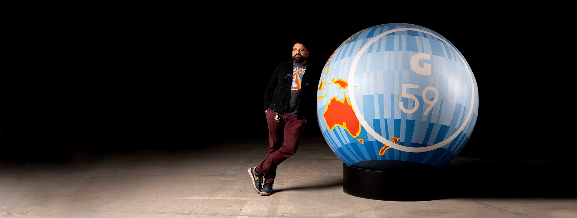 man with giant bingo ball